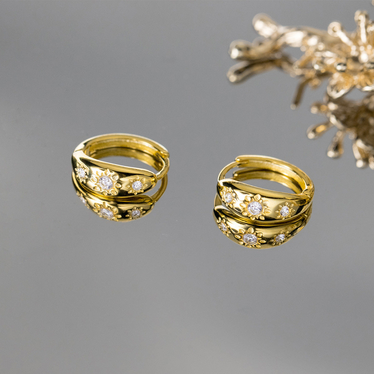 Sterling Silver Huggie Hoop Earrings with a Curved Clicker Design