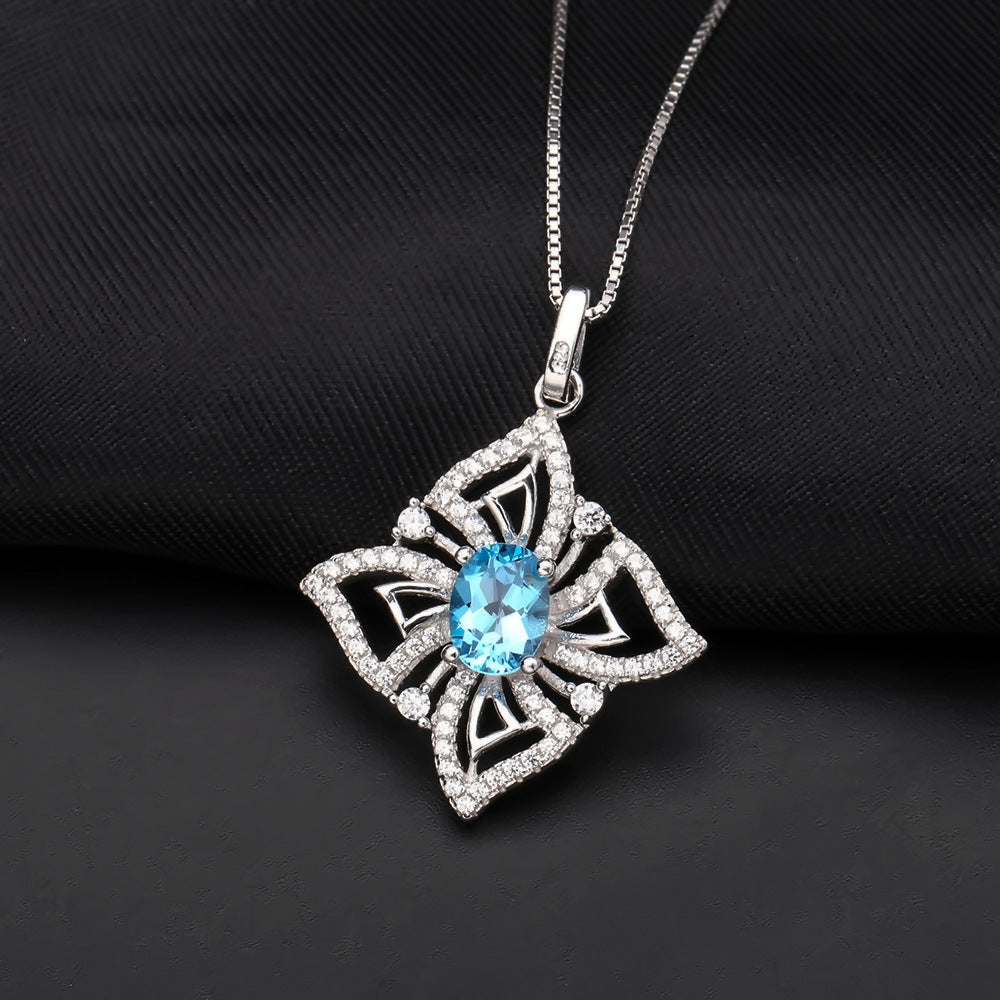 Oval Swiss Blue Topaz Halo Sterling Silver Necklace