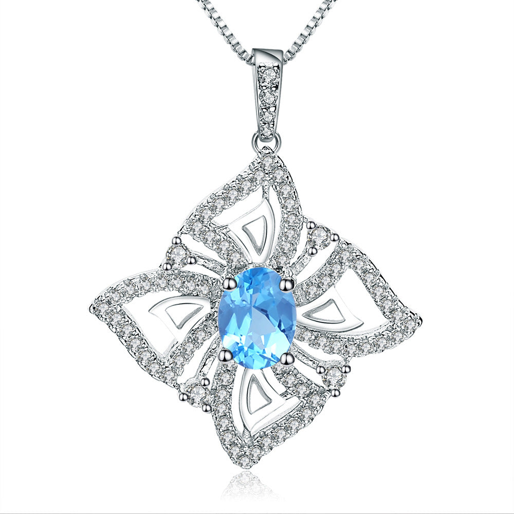 Oval Swiss Blue Topaz Halo Sterling Silver Necklace