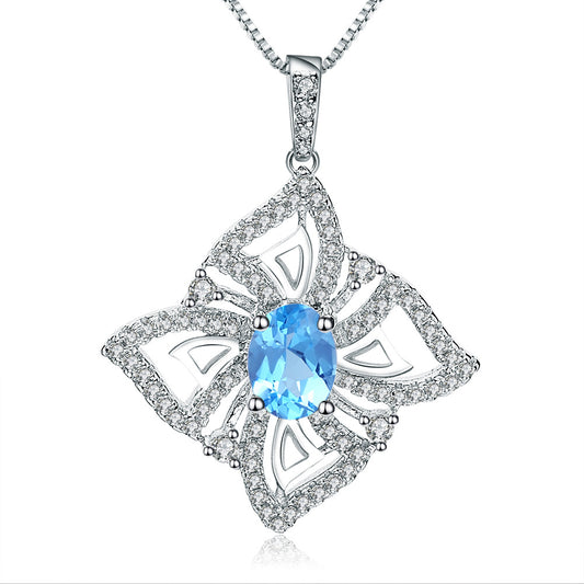 Oval Swiss Blue Topaz Halo Sterling Silver Necklace