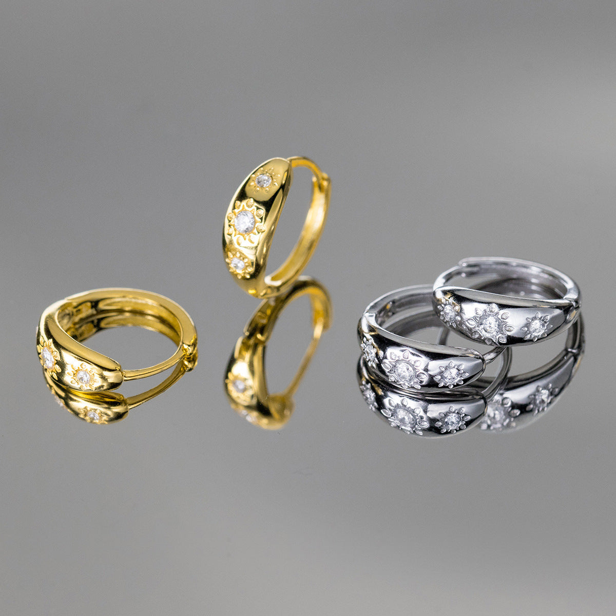 Sterling Silver Huggie Hoop Earrings with a Curved Clicker Design