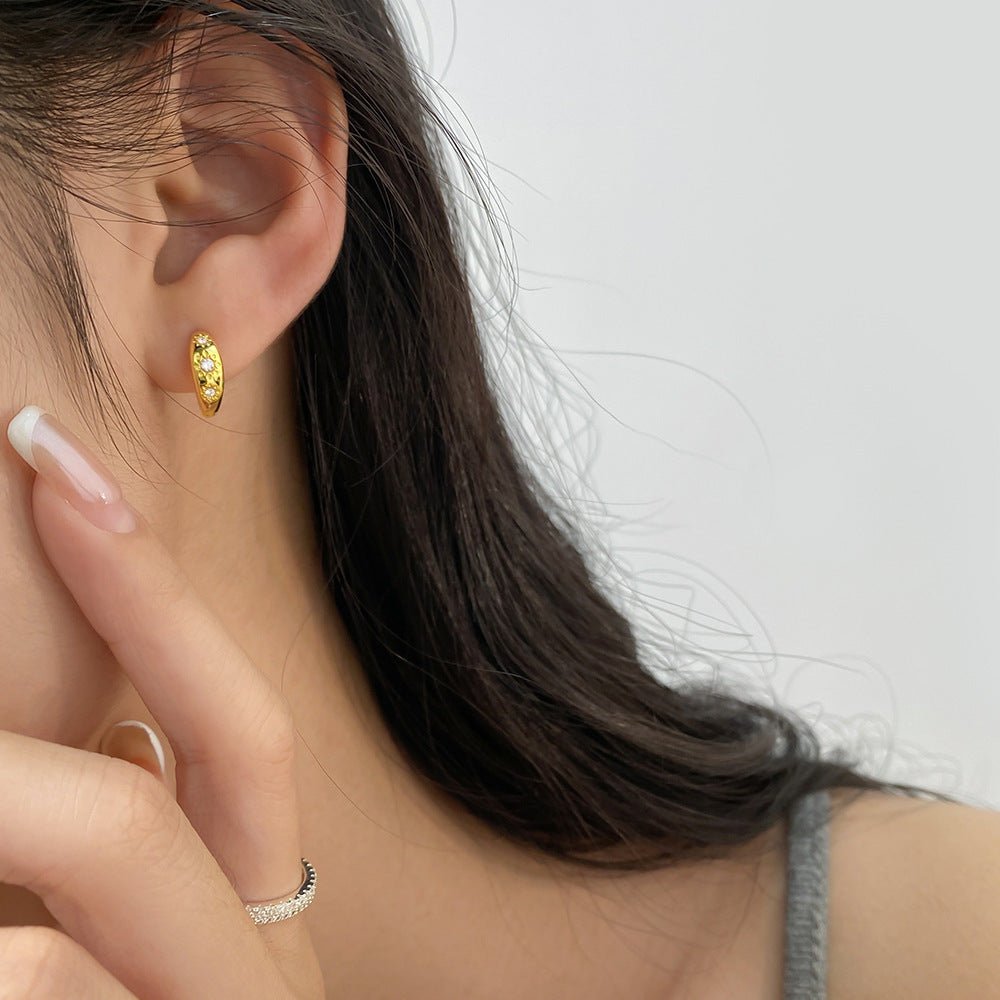 Sterling Silver Huggie Hoop Earrings with a Curved Clicker Design